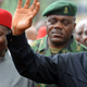Ghanaian President John Dramani Mahama (right) waves to the crowd with Nigerian President Goodluck Jonathan. (AFP)